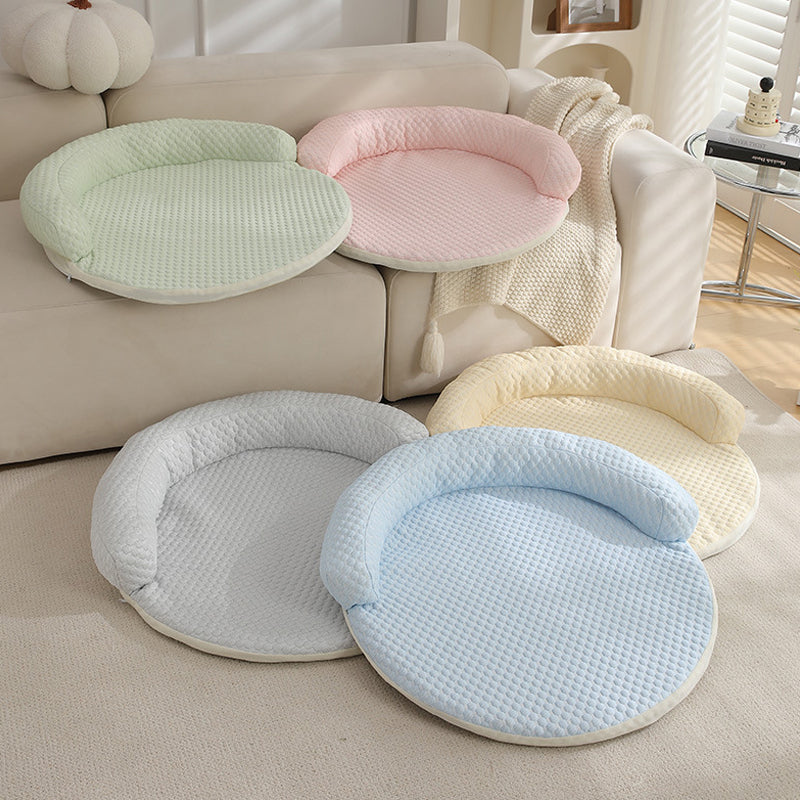 Cooling Dog Bed - Summer Dog Cat Cooling Mat in various colors displayed on a couch for pets.