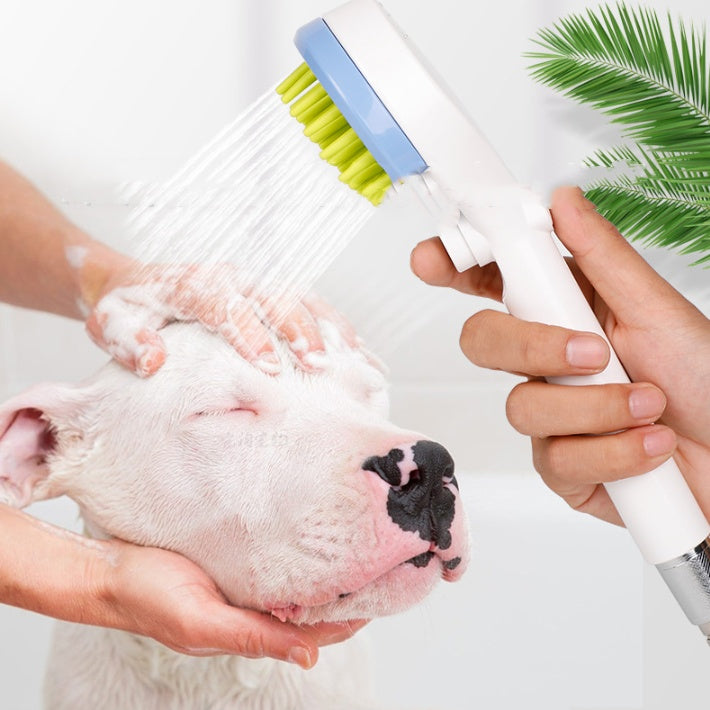 2-in-1 dog bath brush with shower head in use, washing a dog's head, highlighting the shower feature.