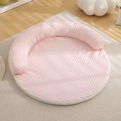 Cooling Dog Bed - Summer Dog Cat Cooling Mat in pink color displayed on a couch for pets.