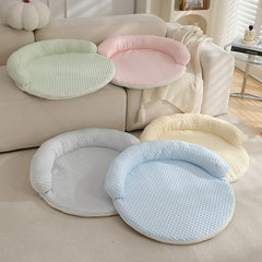 Cooling Dog Bed - Summer Dog Cat Cooling Mat in various colors displayed on a couch for pets.
